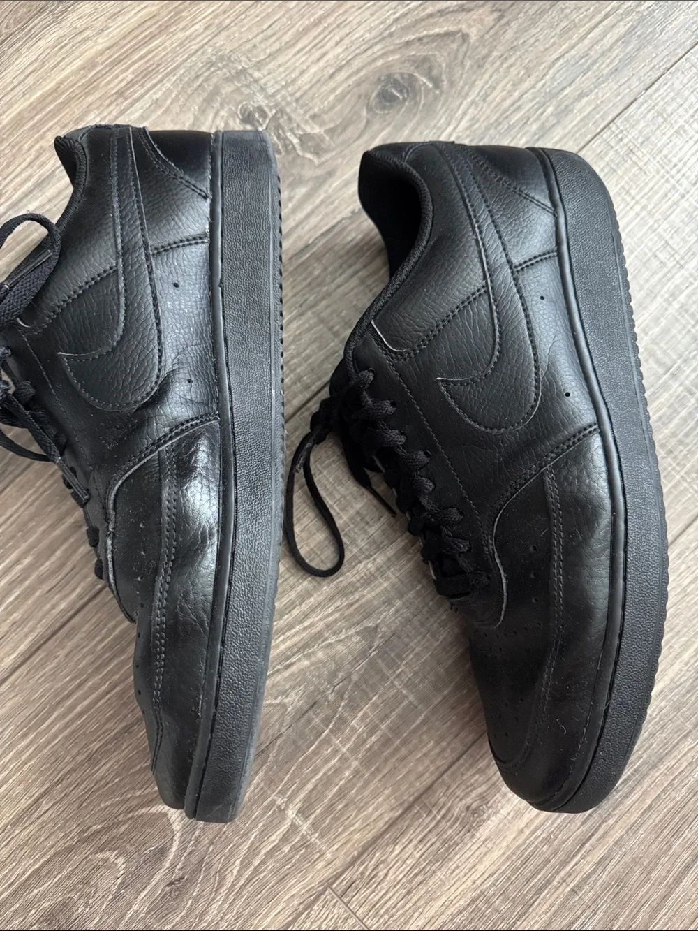 Nike Men’s All-Black Low-Top Leather Sneakers